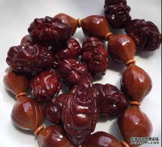 娜姐说文玩：你的橄榄核，为什么玩不出酒红色？原因就在这里！